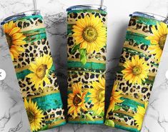 three sunflowers and leopard print travel mugs on a marble surface with the words,