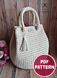 an image of a handbag with the text free pattern on it and flowers in the background