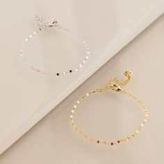 Our Josephine Chain Bracelet is a unique and dainty twist on a traditional anchor link. Each charm is placed perfectly to deliver a mirror-like glow. This the perfect versatile piece to wear alone or dress up your wrist stack. • Material: High Quality Solid 925 Sterling Silver• Finish: Sterling Silver ∙ 18K Gold• Featuring a dainty mirror link chain with adjustable length from 6 to 8 inches SKU: RR-BR024 Wrist Stack, Wrist Stacks, Link Chain, Solid 925 Sterling Silver, Sterling Silver Bracelets, Chain Bracelet, Gifts For Mom, 18k Gold, Ring Size