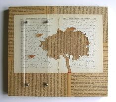 an old piece of paper with writing on it and a tree cut out from the pages