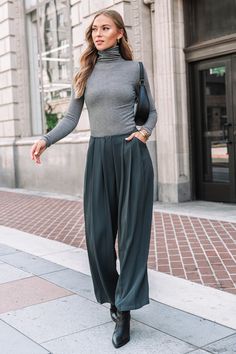 Stay effortlessly chic with the Grey Long Sleeve Turtleneck. Its classic design and comfortable fit make it a versatile staple for layering or wearing solo. Product code: CAA06A4J179BB Features:  Knit Turtleneck Long sleeves Wash Method: Regular Wash Material: 50%RAYON,29%POLYESTER,21%NYLON. Gray Turtleneck Tops With Ribbed Cuffs, Stretch Ribbed Long Sleeve Turtleneck, Wool Turtleneck With Ribbed Cuffs Long Sleeve, Gray Stretch Turtleneck Sweater, Gray Soft Knit Turtleneck Top, Knit Turtleneck, Make Memories, Long Sleeve Turtleneck, The Grey