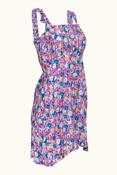 Get ready for Spring with feminine florals from Faithfull the Brand. This dreamy dress comes in a lovely lavender hue with vibrant teal, yellow, and peach flowers blooming throughout. Romantic ruffles and precious pleating add to the bohemian charm of this mini, making it the perfect pairing for a strappy white or teal heel. Size 4 100% Rayon Unlined Hidden side zip Ruffled straps Smocked back Ruffled hem Straight neckline Pleated Elastic neckline Belt loops (belt not included) Bust (unstretched) 26" Waist 28.5" Shoulder to hem 34" Teal Heels, Purple Floral Print, Flowers Blooming, Lovely Lavender, Teal Yellow, Peach Flowers, Dreamy Dress, Straight Neckline, Faithfull The Brand