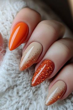 Embrace Autumn with Gorgeous Fall Nail Designs Simple Fall Nails With Glitter, Fall Season Nails Orange, November Nail Designs Fall, Fall Almond Nails Ideas Orange, Almond Nails October 2024, Classy Oval Nails Fall, Burnt Orange Ombre Nails Fall, Orange Glitter Nails Fall, Thanksgiving Gel Nails Designs