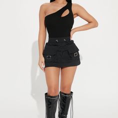 Black Cargo Mini Skirt With Adjustable Waist Band Edgy Black Skort, Edgy High-waist Black Cargo Skirt, Fitted Black Mini Cargo Skirt, High Waist Black Cargo Skirt, Casual Black Cargo Skirt For Summer, Chic Fitted Black Cargo Skirt, Edgy Black High Waist Mini Skirt, Black Summer Skort For Club, Edgy Fitted Black Cargo Skirt