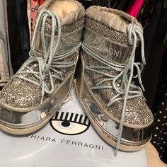 Beautiful Moon Boots Size 38-40, They Are Beautiful Very Stylish, Made In Italy, Great Conditions, Very Comfortable. Comes With Box And Dust Bag Silver Color. Luxury Silver Winter Boots, Chiara Ferragni Shoes, Bag Silver, Moon Boots, Beautiful Moon, Winter Rain, Chia, Rain Boots, Silver Color