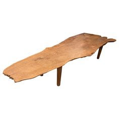 an old wooden bench made out of wood