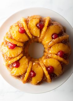 a pineapple upside down cake on a white plate