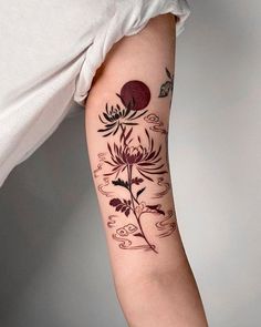 a person with a tattoo on their arm