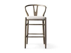 a wooden bar stool with a white upholstered seat and backrest, viewed from the front