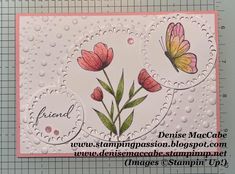 a card with flowers and butterflies on it