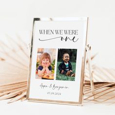 a photo frame with the words, when we were one and two photos on it