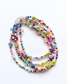 multicolored beaded necklace with smiley face charms