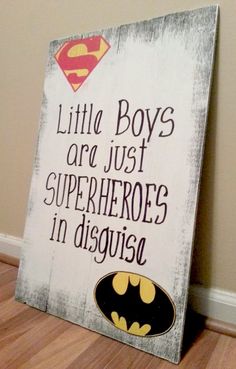 a wooden sign that says, little boys are just superheros in disguise