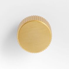 an empty cupcake tin on a white background