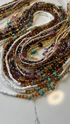 I'm pleased to offer my handmade waist beads to you at wholesale pricing. With these strands, you will be able to make at minimum 2x profit off of your initial investment( depending on your markup). All waist beads will be traditional tie-ons on a standard 50-inch string. These waist beads will be seed beads and accent beads. As well as an option for crystal waist beads. There are 3 design options to choose from 1. Intuitive design- Leave it to me and I'll intuitively create all the waist bead s Turquoise Waist Beads, Waistbeads With Crystals, Meditation Waist Beads, Bohemian Multi-strand Waist Beads As Gift, Bohemian Multi-strand Waist Beads For Gift, Bohemian Style Colorful Waist Beads For Gift, Handmade Bohemian Waist Beads As A Gift, Handmade Bohemian Waist Beads For Gift, Bohemian Handmade Waist Beads As A Gift