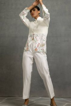 White top in linen base with floral and tabla instrumental embroidery in thread, sequins and beads. Paired with a pant. - Aza Fashions Floral Embroidered Top, Top And Pants Set, Collar Top, Pant Set, Embroidered Top, Set For Women, High Collar, White Top, White Linen