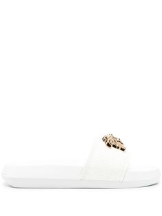 white Medusa plaque detail signature Greca detailing embossed logo to the rear open toe slip-on style moulded footbed flat rubber sole Versace Slides, Slides Shoes, Embossed Logo, Slide Slipper, Open Toe, Rubber Sole, Versace, Slides, Men's Shoes