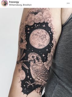 a woman's arm with an owl and moon tattoo on the left side of her body