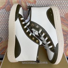 Michael Kors Shea Mid High Top Faux Leather 49f3shfesl Olive New In The Box Authentic Mk Sneakers Sporty High-top Leather Custom Sneakers, White High-top Sneakers For Fall, White Leather Sneakers With Leather Footbed, Trendy White Leather Sneakers, Casual White Leather High-top Sneakers, Sporty White Sneakers With Leather Trim, Leather High-top Sneakers For Sports With Logo, White Leather High-top Sneakers With Round Toe, Michael Kors Leather Sneakers With Cushioned Footbed