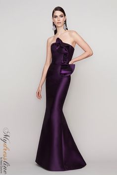 Looking for a show-stopping strapless gown? Check out the Frascara 4135! This gorgeous dress features ruffled detailing from the bodice to the side peplum, and has a fit and flare silhouette that is sure to flatter your figure. Plus, there's a hidden back zipper and the dress is satin-lined for an extra touch of luxury. Made from 87% polyester and 13% silk, this dress is sure to turn heads! Purple Elegant Dresses, Mermaid Style Dress, Plastic Dress, Silk Satin Dress, Sophisticated Outfits, Cascading Ruffles, Evening Dress Fashion, Strapless Gown, Mermaid Fashion