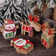 christmas decorations made out of wood and paper