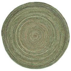 a round rug on a white background with green and beige colors, in the shape of a circle