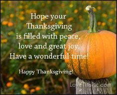 a pumpkin sitting on top of a wooden post with the words hope your thanksgiving is filled with peace, love and great joy have a wonderful time