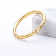 MEASUREMENT: - Band width : 2 mm - Height off Finger : 1.6 mm approx. - Material: 14K - Color: As you order. Available in all colors. - Approx weight : 2 grams - Fit : Comfort Fit This item is also available in 10K, 18K and PLAT. ( Please contact us for quotes ) **If your size is not available, please contact us for the price. This item is MADE TO ORDER. (Rush orders may be possible. Please contact us before placing a rush order. Thank you.) Processing time : 6-10 days Heirloom Engraved Stackable Ring For Formal Occasions, Gold Wedding Bands With Engraving Option, Elegant Ceremonial Ring With Engraving Option, Yellow Gold Engraved Stackable Wedding Rings, Round Engraved Bands For Marriage, Engraved Yellow Gold Stackable Rings For Wedding, Engraved Yellow Gold Stackable Wedding Rings, Yellow Gold Wedding Jewelry With Engraving Option, Elegant Etched Jewelry For Marriage