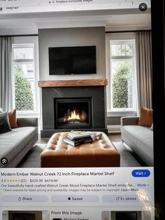 an image of a living room with fireplace and couches on the webpages