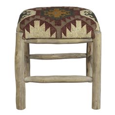 a wooden stool with a colorful cushion on it