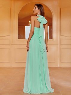 Product Code: FSWD1198 Embellishment: Chiffon Fabric: 100% Polyester Back Style: Zipper Up Fully Lined: Yes Built-in Bra: Yes Available Color: Mint Stretch: Moderate Fits true to size Imported Model Information: Height: 5' 2" Bust: 33.5'' Waist: 24“ Hips: 35.5” wearing US size Small Summer Georgette Chiffon Prom Dress, Summer Georgette Chiffon Dress For Prom, Sleeveless Green Georgette Dress, Green Sleeveless Georgette Dress, Elegant Floor-length Green Chiffon Dress, One Shoulder Georgette Wedding Dress, One-shoulder Georgette Wedding Dress, Green Chiffon Maxi Dress For Banquet, Elegant Green Floor-length Chiffon Dress