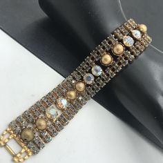 "Vintage Rhinestone Bracelet, 1950's 1960's Fashion, Collectible Jewelry, High End Bracelet, Glass Jewelry, Juliana Bracelet In very good vintage condition. Measures 7 3/4\" x 1\" wide A very classy addition to any vintage jewelry collection. #vintage #jewelry #vintagejewelry #rhinestone #bracelet d33" Juliana Jewelry Vintage, Vintage Bling Bracelets As Gifts, Adjustable Vintage Beaded Bracelet For Wedding, Antique Jeweled Bracelets For Party, Vintage Adjustable Jeweled Bracelets, Vintage Gold Beaded Bracelets For Wedding, Vintage Gold Beaded Wedding Bracelets, Vintage Gold Beaded Wedding Bracelet, Adjustable Vintage Jeweled Bracelets