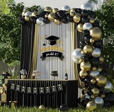 a graduation party with balloons and decorations