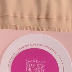 a pink plate with the words stay for the party on it sitting on a table