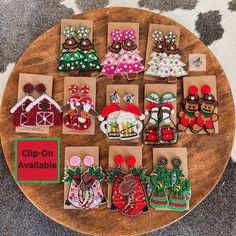 a wooden table topped with lots of small christmas decorations