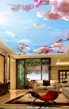 the ceiling is decorated with pink flowers and blue sky