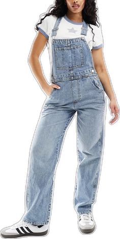 Utility Style High Rise Medium Wash Overalls, Utility High Rise Medium Wash Overalls, Denim Overalls With Adjustable Straps, Utility Denim Overalls With Belt Loops, Utility High Rise Overalls With Pockets, Medium Wash Denim Bottoms With Suspenders, Denim Bib Front Bottoms With Adjustable Straps, Casual Denim Overalls With Belt Loops, Trendy Medium Wash Bottoms With Adjustable Straps