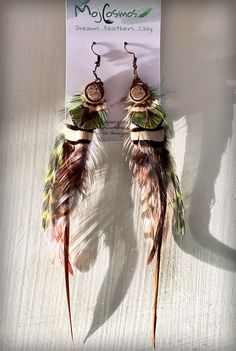 Fine feathered, Boho earrings, muted greens and earthy coloured, natural feathers and Peacock feathers, ear wire hook, antique bronze hardware, mother of pearl stones. Handmade and gift boxed. Inspired by my belle Michelle. Brown Feather Dangle Earrings, Bohemian Brown Feather Jewelry, Green Bohemian Feather Earrings, Bohemian Green Feather Earrings, Green Bohemian Earrings With Feathers, Boho Feathers, Bronze Hardware, Peacock Feathers, Feather Earrings