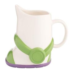 a white and green coffee cup with purple trim