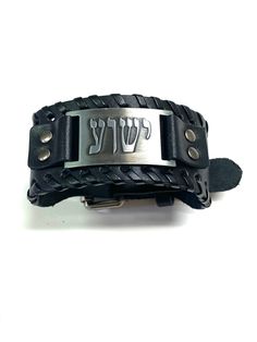 Listing for 1 Leather Bracelet. Please choose one of three styles. :-) YESHUA Modern Hebrew Bracelet Leather Cuff Bracelet Hebrew Jewelry, Hebrew Name YHWH. Shipped with USPS First Class. Adjustable buckle. Length of buckle to holes adjust from 7 1/4 to 9 1/4 inches (Measured from the inside top of Buckle to the smallest hole and to the largest hole) If your wrist diameter measures from 6 to 9 inches You should be able to wear this bracelet. CHOOSE YOUR CUFF, OPTIONS BELOW: 1. Brown leather with Silver Leather Band Bracelet As Gift, Silver Leather Band Bracelet For Gift, Hebrew Bracelet, Hebrew Jewelry, Leather Cuff Bracelet, Bracelet Leather, Leather Cuffs Bracelet, Torah, Leather Cuffs