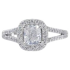 a cushion cut diamond ring with double halos