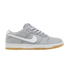 Find NIKE Dunk Low Pro Iso Sb 'wolf Gum on Editorialist. The Nike Dunk Low Pro ISO SB 'Wolf Grey Gum' treats the retro model to a refined and neutral makeover. A subtle shade of grey suffuses the leather upper, accented with contrasting hits of white on the signature Swoosh and Nike-branded heel tab. Atop the padded tongue, a bright orange Swoosh stands out on the woven Nike SB tag. Orange Label branding adorns the insole, featuring a springy Zoom Air unit embedded in the heel. A rubber cupsole, built with white sidewalls and a sticky gum rubber outsole, anchors the low-profile silhouette. Nike Sb Dunk Low Pro, Nike Branding, Gray Shoes, Sb Dunk Low, Nike Sb Dunks Low, Nike Brand, Skate Shoe, Sb Dunk, Grey Nikes