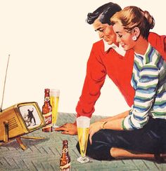 two people sitting on the ground with beer