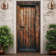 an old wooden door with two planters next to it