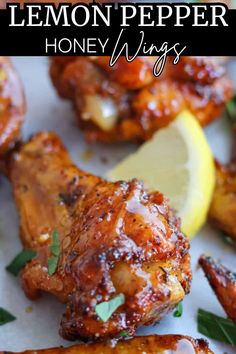 lemon pepper honey wings on a white plate