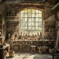 a room filled with lots of pots and pans on top of wooden shelves next to a window