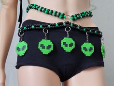 This kandi belt is made with neon pony beads and alien perlers. Glows under blacklight and in the dark! Includes one kandi belt. Harness sold separately. One size fits most. This item ties in the back for easy adjusting. This Item is premade and is ready to ship! Perfect for any event! You will get lots of compliments in this unique wearable art! Stand out at your next event! Edm festival  Raves Party  Rave outfit  Festival outfit Pride Mardi gras Rave gift  Rave birthday Glow party Lifestyle pa Kandi Waist Chain, Alien Bead Pattern, Kandi Harness Pattern, Alien Kandi Pattern, Perler Bead Belt Chain, Kandi Belt Chain, Emo Rave Outfit, Space Kandi, Kandi Goggles