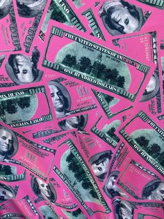 pink dollar bills are scattered on top of each other in this pattern, which is very similar to the american one hundred dollars bill