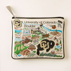 a zippered pouch with the university of colorado map on it, hanging from a wall