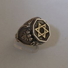 Men silver signet ring with gold Magen David.  Classic design men ring. Classic Sterling Silver Signet Ring For Ceremonial Events, Classic Star Of David Jewelry For Anniversary, Classic Star-shaped Ring For Formal Occasions, Star Of David Engraved Ring As Gift, Symbolic Silver Signet Ring In 14k Gold, Silver Star Of David Jewelry In 14k Gold, Engraved Star Of David Ring As Gift, Classic White Gold Star Of David Jewelry, Star Of David Engraved Rings For Gifts